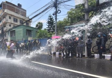 Protesters brought under control using water cannon